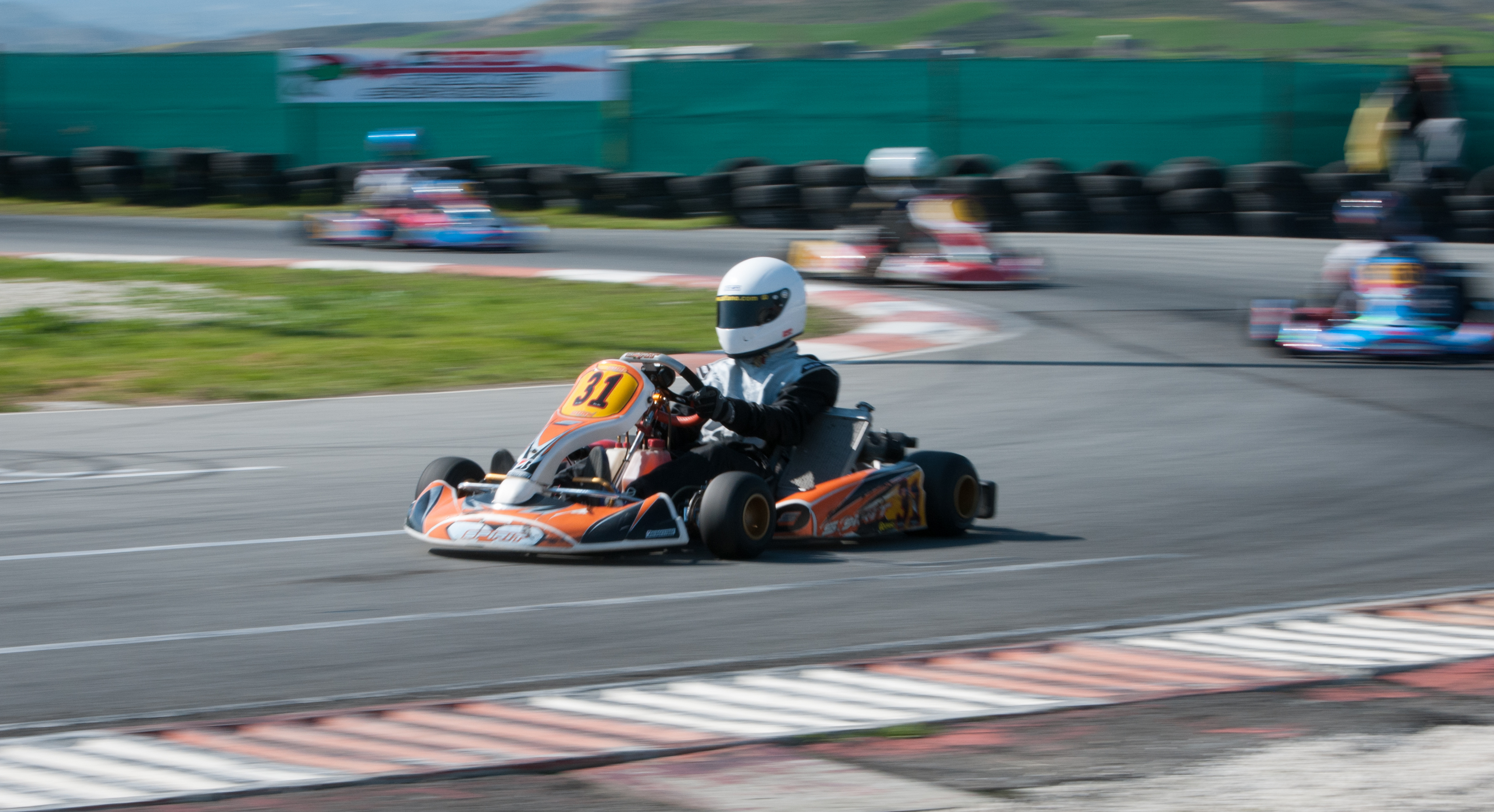 Young female driver looking hopeful about a career in motorsport.